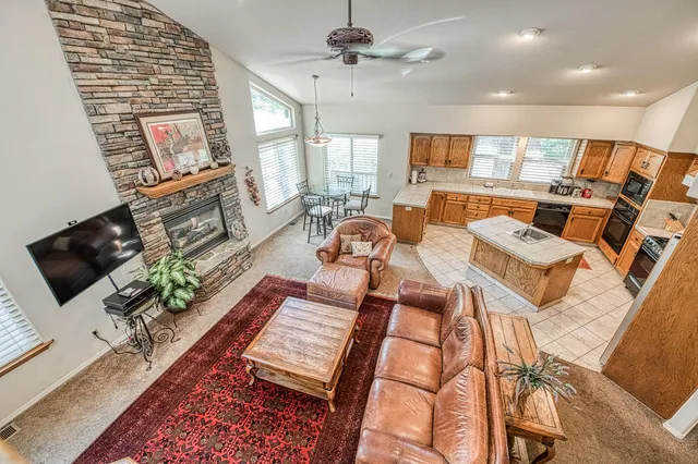 a living room with furniture and a window