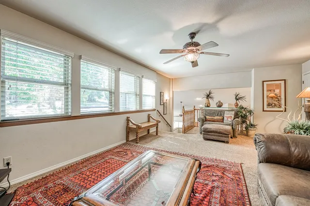 a bedroom with a bad and dresser