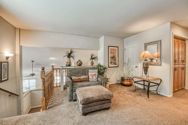 a bathroom with a sink a toilet a mirror and shower