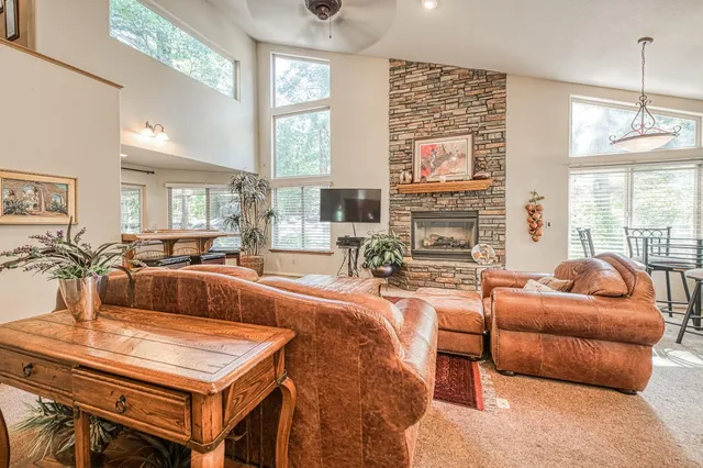 a view of a dining room with furniture window and outside view