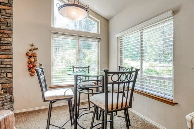 a large kitchen with kitchen island a stove a sink dishwasher and a refrigerator