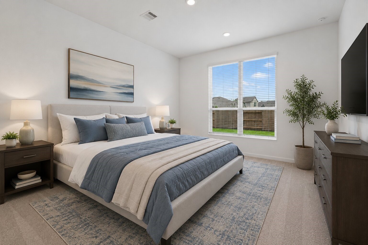 2720 Grove Crest Drive Rosenberg, TX 77469 - Photo 17 of 32 Expansive primary suite featuring plush carpeting, abundant natural light, and ample space for a private seating area or king-sized furnishings.