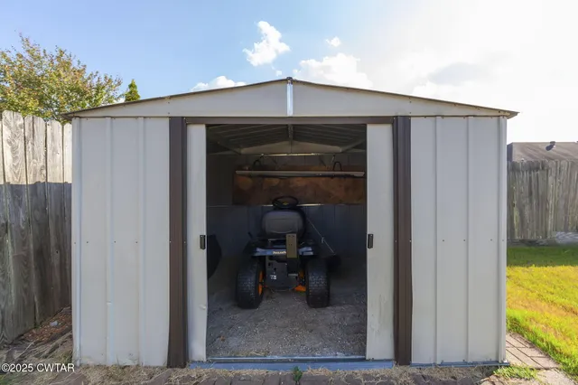 a front view of a house with yard