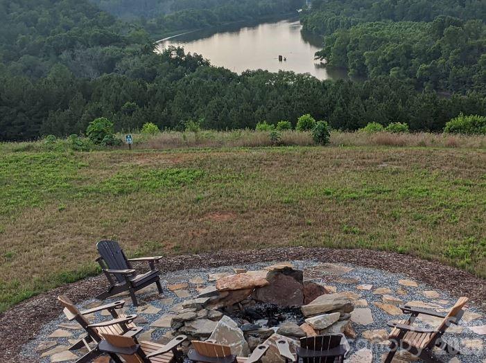 98 Sundown Road Morganton, NC 28655 - Photo 4 of 13 a view of a forest with a sink