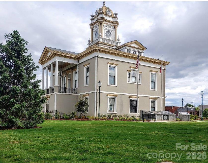 98 Sundown Road Morganton, NC 28655 - Photo 10 of 13 a front view of a house with a garden