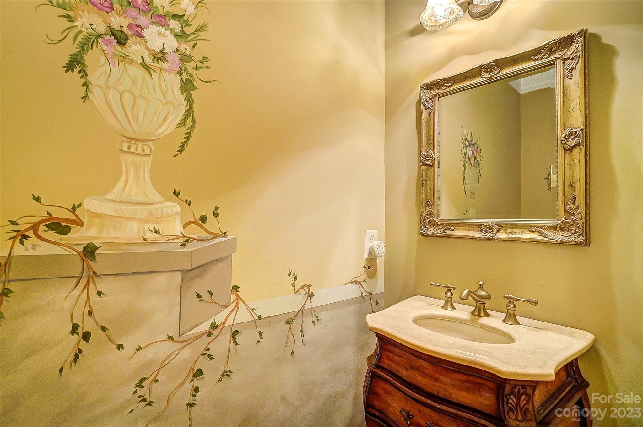 3312 Helms Pond Road Monroe, NC 28110 - Photo 36 of 39 a bathroom with a sink and a mirror