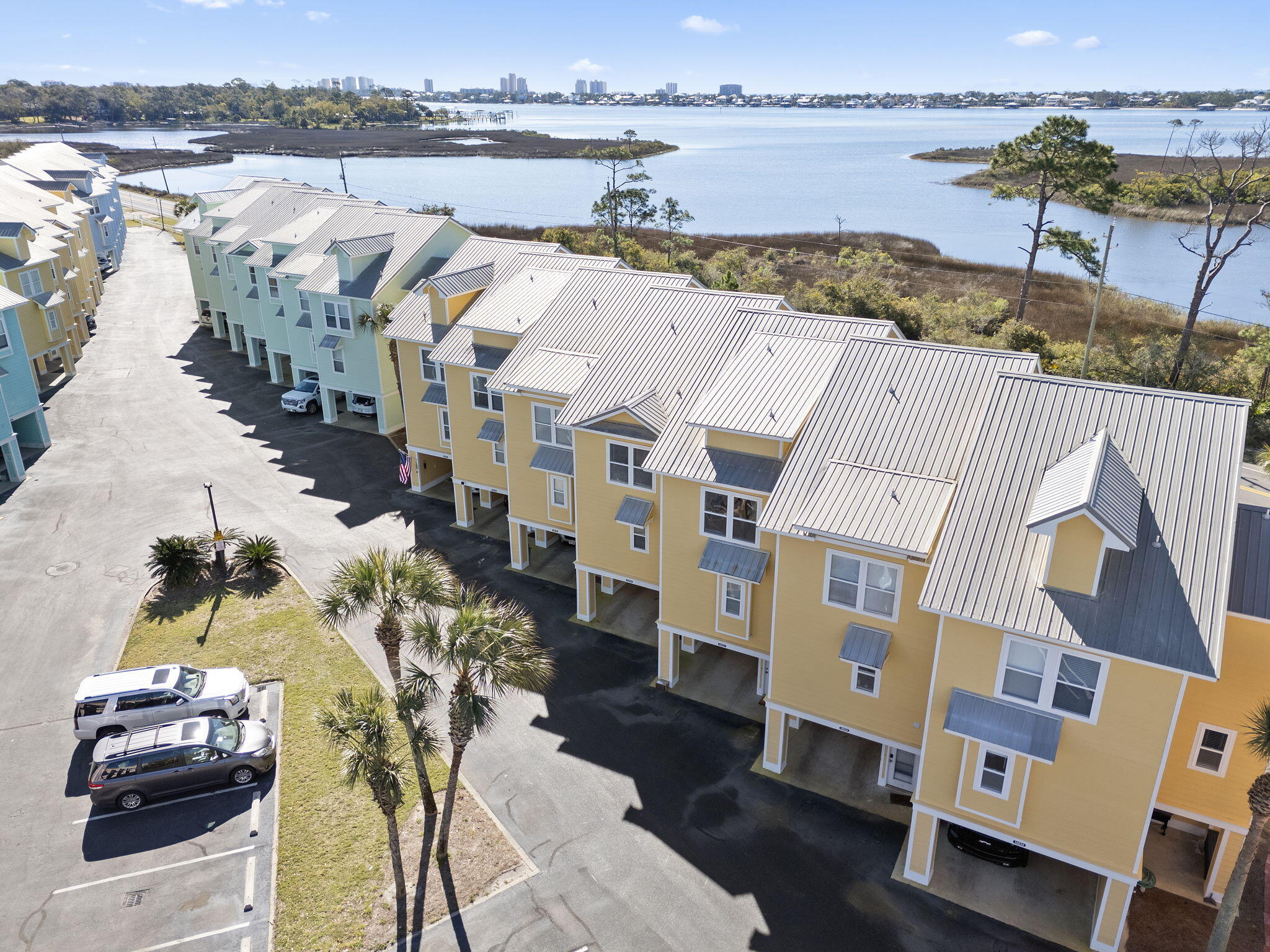16020 Innerarity Point Road Pensacola, FL 32507 - Photo 1 of 38 a view of a lake with building in front of it