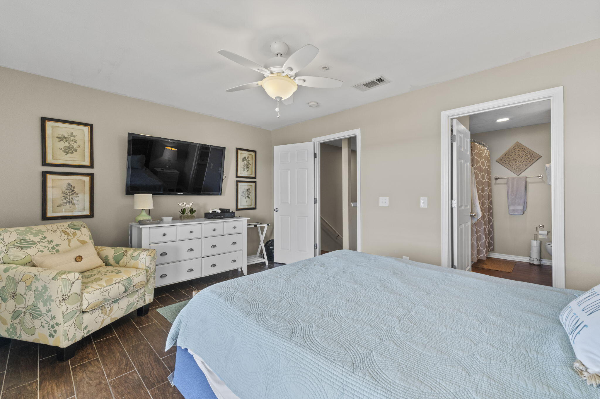 16020 Innerarity Point Road Pensacola, FL 32507 - Photo 17 of 38 a bedroom with furniture and a flat screen tv