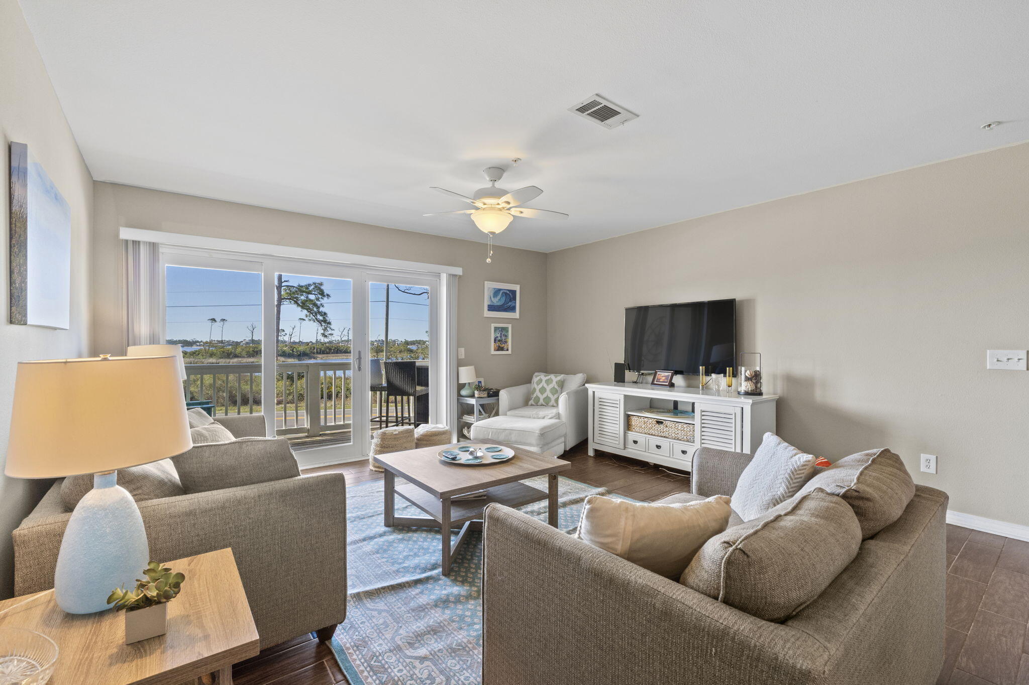 16020 Innerarity Point Road Pensacola, FL 32507 - Photo 5 of 38 a living room with furniture and a flat screen tv
