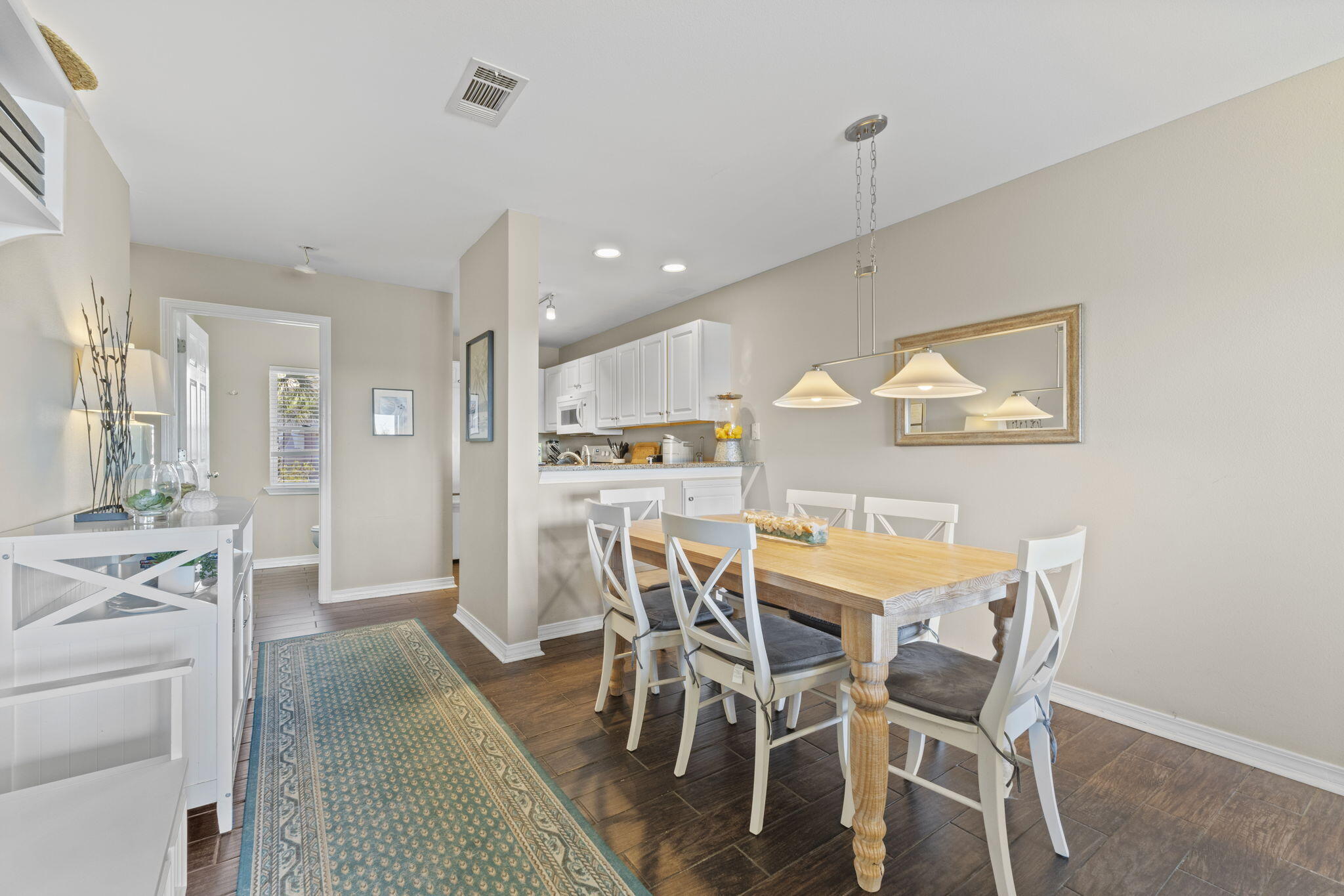 16020 Innerarity Point Road Pensacola, FL 32507 - Photo 7 of 38 a view of a dining room with furniture and wooden floor