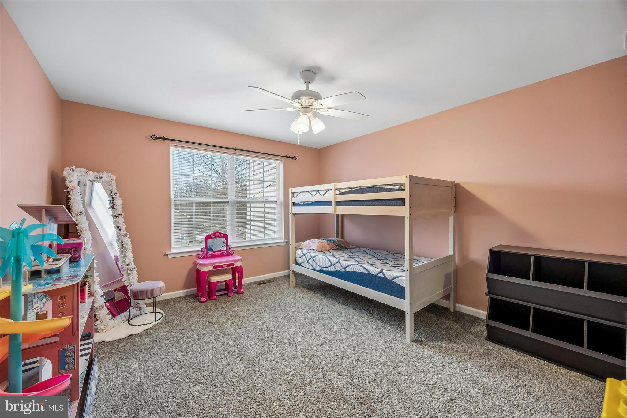 709 Shadyside Avenue Croydon, PA 19021 - Photo 20 of 40 a bedroom with furniture and a chandelier