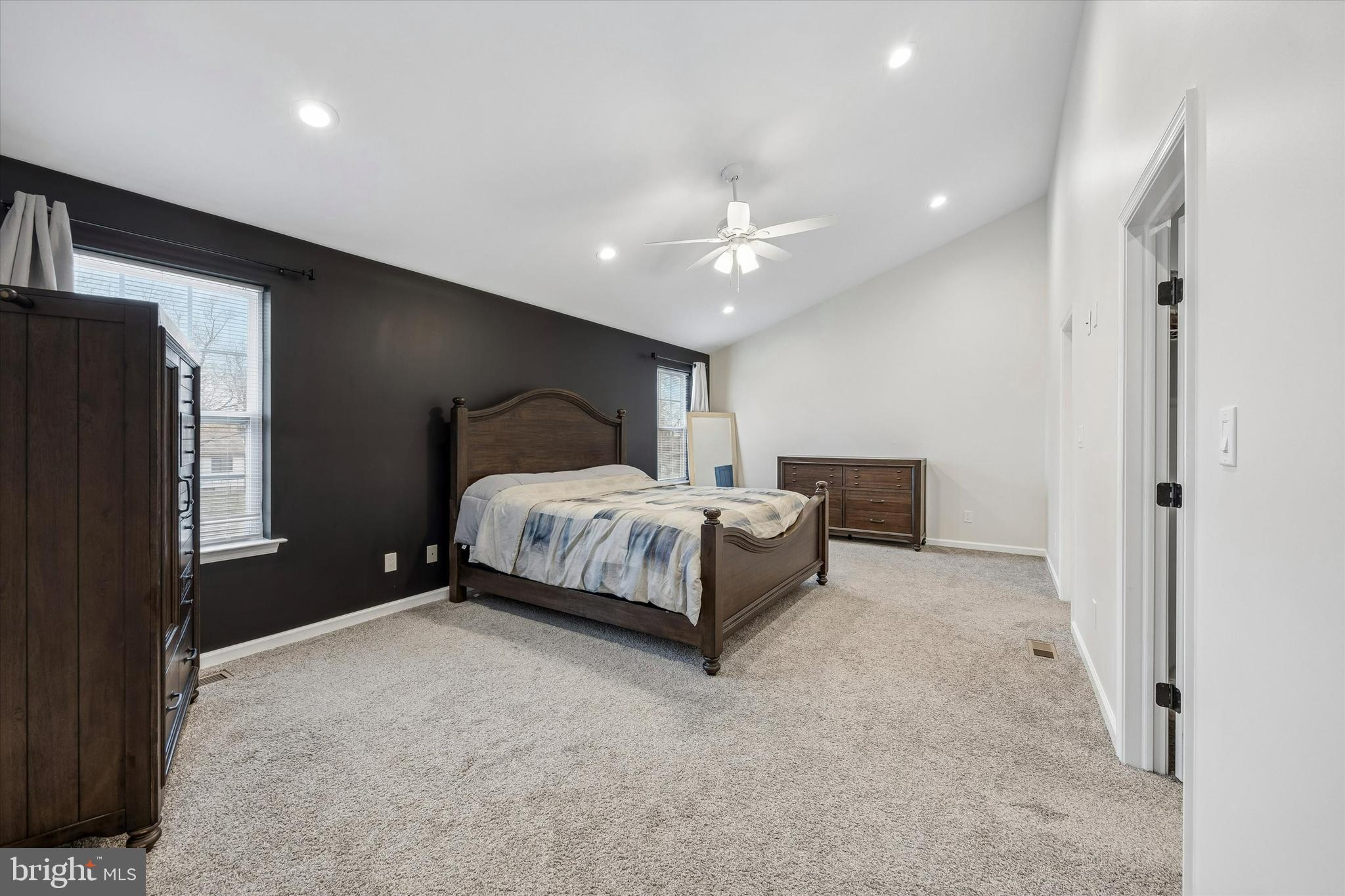 709 Shadyside Avenue Croydon, PA 19021 - Photo 23 of 40 a spacious bedroom with a bed and a chandelier
