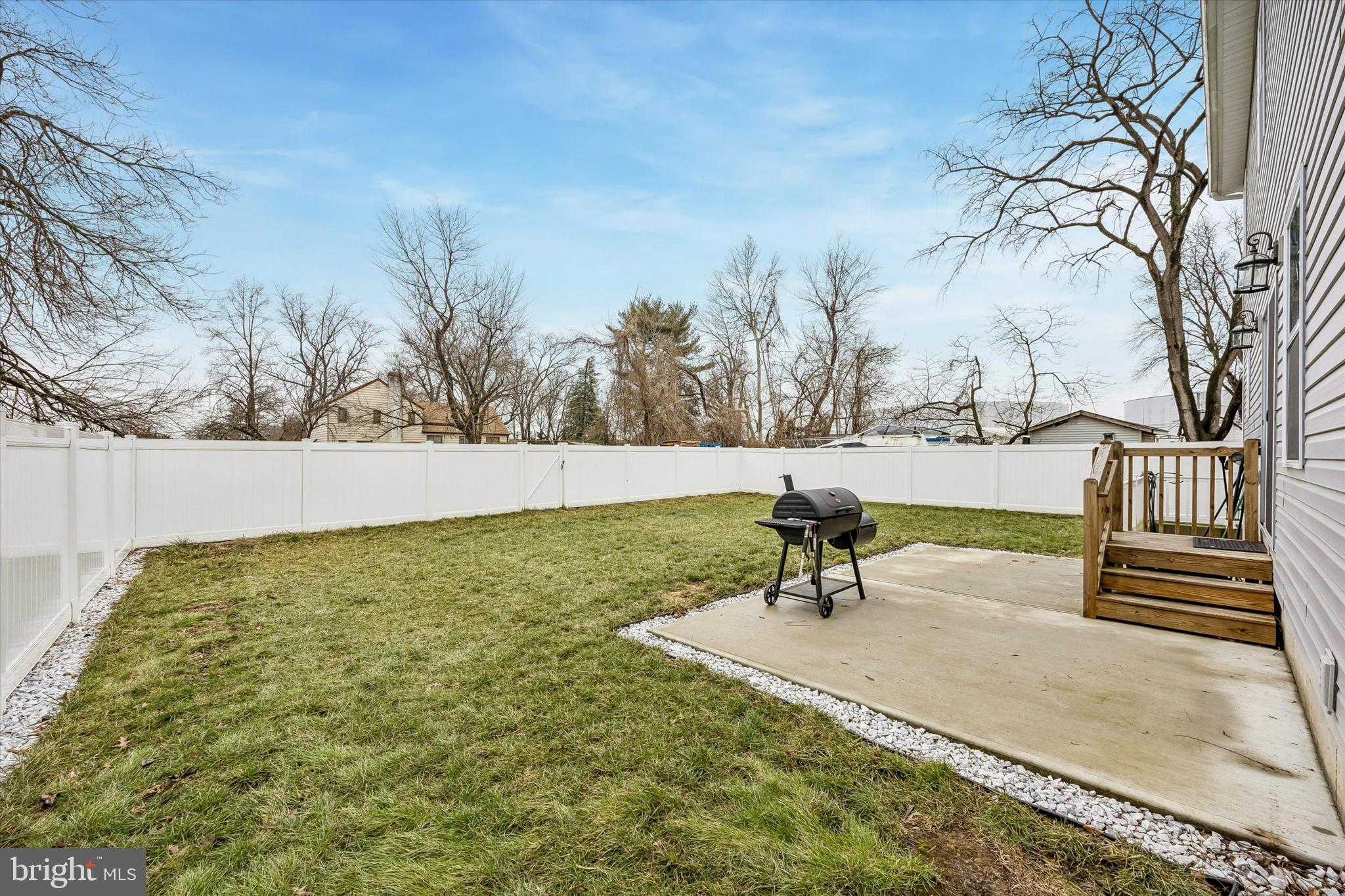 709 Shadyside Avenue Croydon, PA 19021 - Photo 34 of 40 a bench is sitting in the middle of a yard