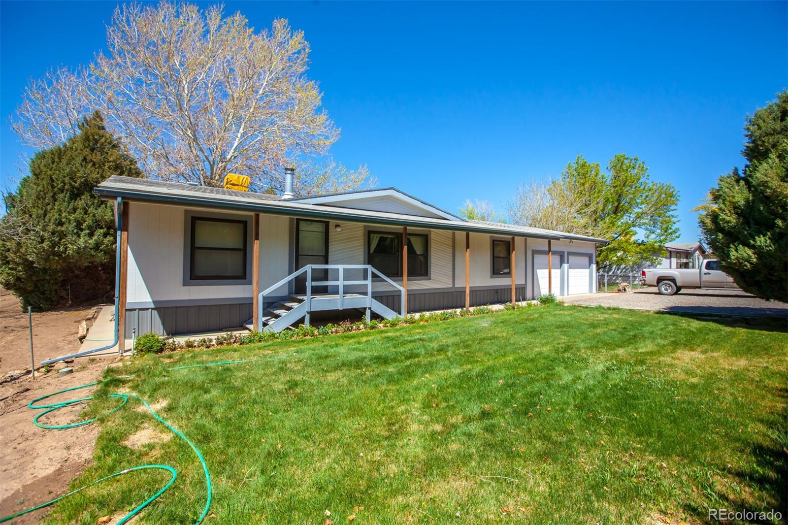 3281 C Road Palisade, CO 81526 - Photo 27 of 33 a front view of a house with garden