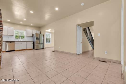 141 Arneys Mt Road Pemberton, NJ 08068 - Photo 14 of 29 an empty room with kitchen and natural light