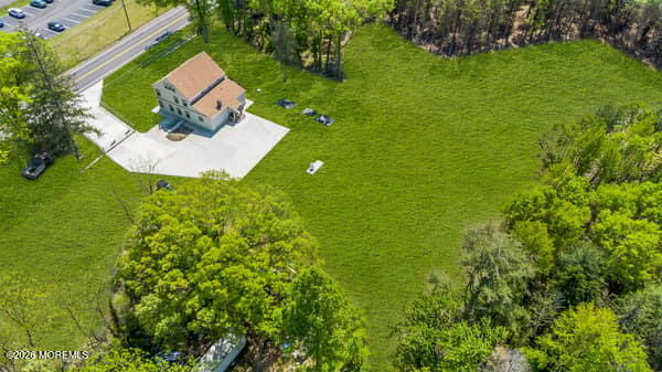 141 Arneys Mt Road Pemberton, NJ 08068 - Photo 5 of 29 a view of a garden with a slide