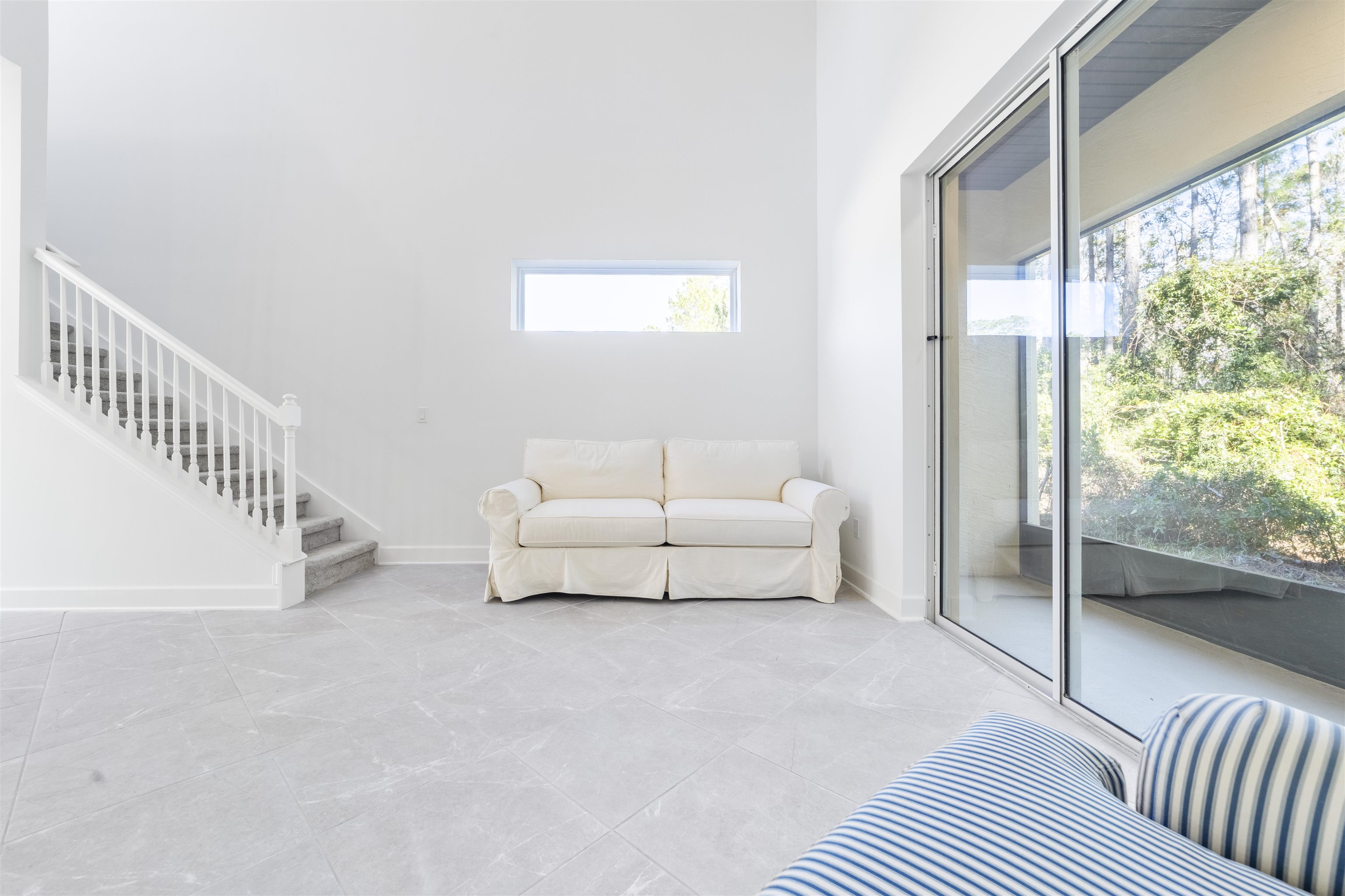 272 Grand Ravine Drive St. Augustine, FL 32086 - Photo 12 of 41 a living room with furniture and a window