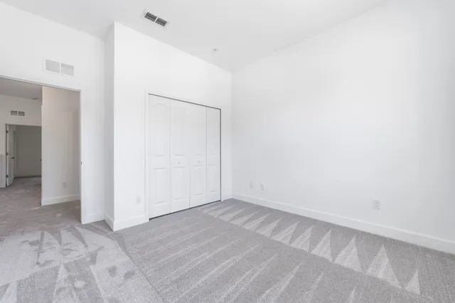 an empty room with closet