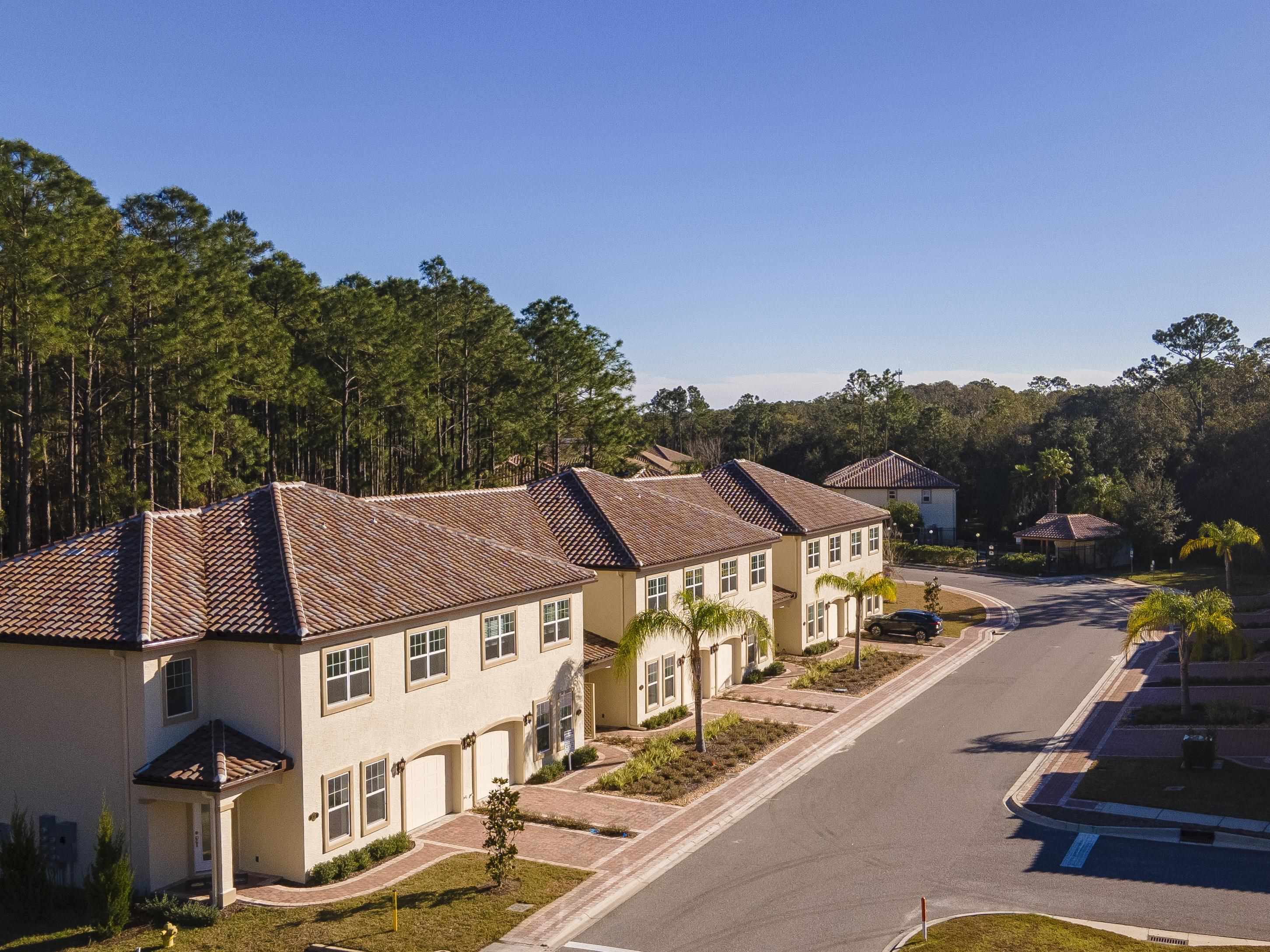 272 Grand Ravine Drive St. Augustine, FL 32086 - Photo 38 of 41 an aerial view of a residential apartment building with a yard