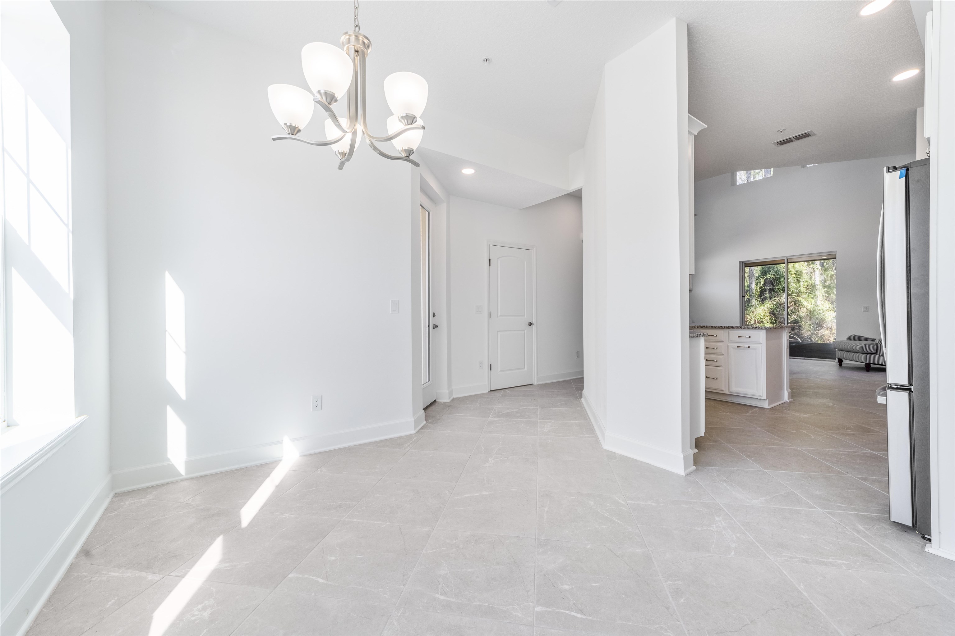 272 Grand Ravine Drive St. Augustine, FL 32086 - Photo 7 of 41 a view of a livingroom with a chandelier