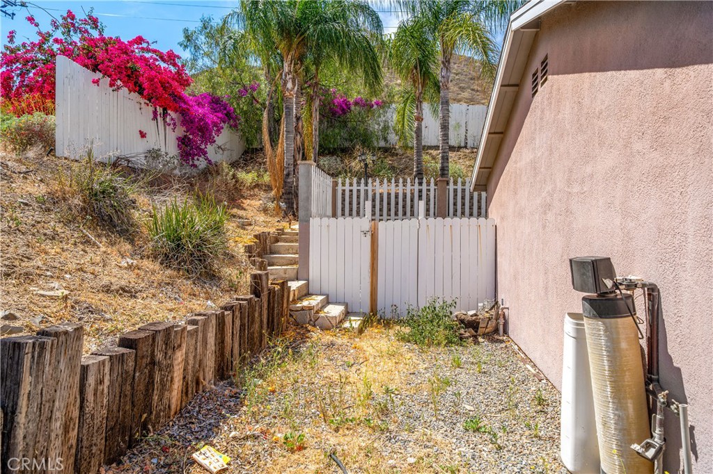 29582 Toomas Circle Menifee, CA 92587 - Photo 25 of 30 a small garden in the corner of a house