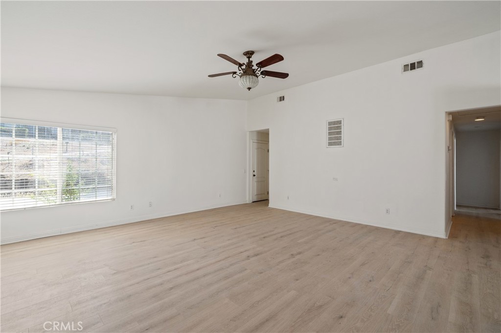 29582 Toomas Circle Menifee, CA 92587 - Photo 3 of 30 a view of an empty room with a window