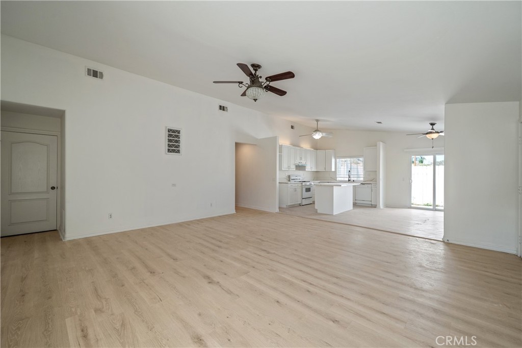 29582 Toomas Circle Menifee, CA 92587 - Photo 4 of 30 a view of a kitchen with a sink and a window