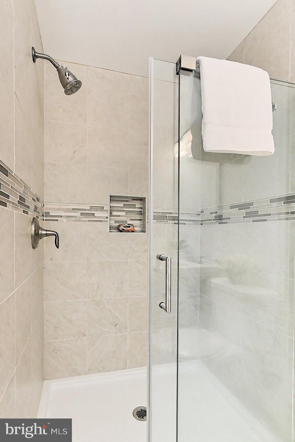 6808 Sydenstricker Road Springfield, VA 22153 - Photo 30 of 65 Gorgeous ceramic tile primary shower