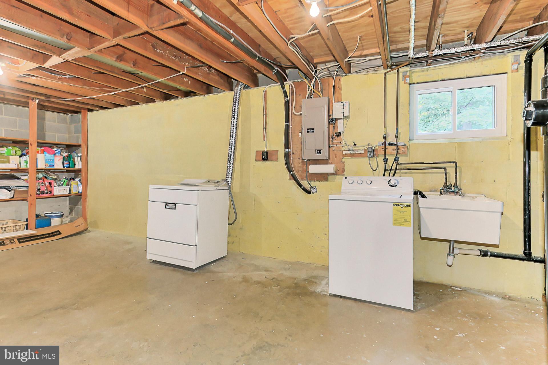 6808 Sydenstricker Road Springfield, VA 22153 - Photo 41 of 65 Large laundry area with utility sink
