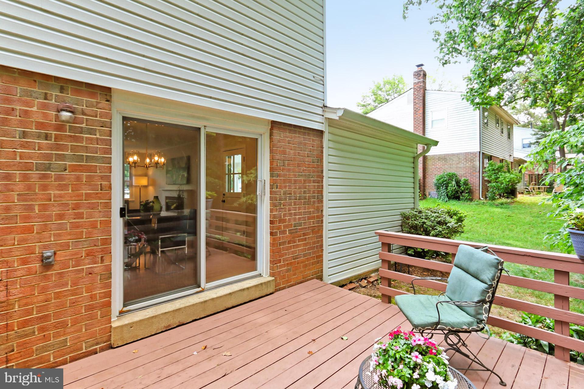 6808 Sydenstricker Road Springfield, VA 22153 - Photo 48 of 65 Rear deck and slider to eating area in family room
