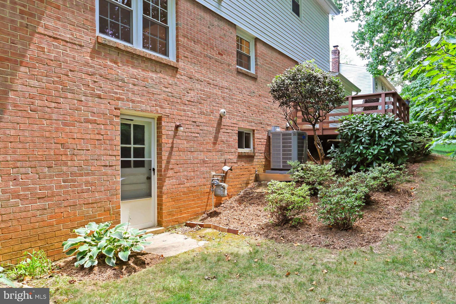 6808 Sydenstricker Road Springfield, VA 22153 - Photo 49 of 65 Rear walk-out from lower level recreation room
