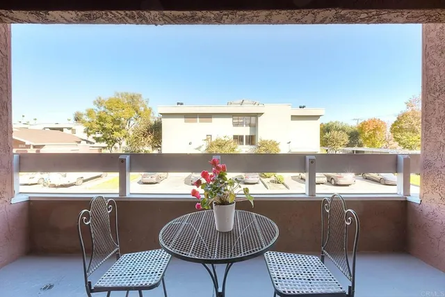 a kitchen with a table and chairs in it