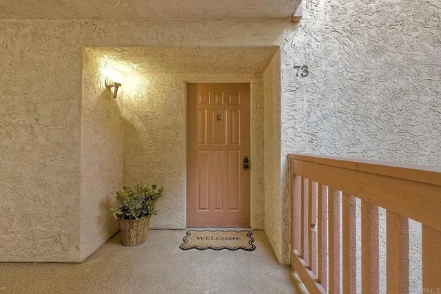 a view of a porch with a door