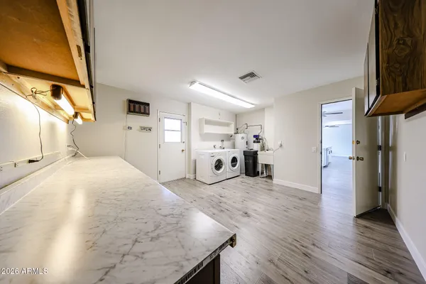 a room with a bed and a view of bedroom