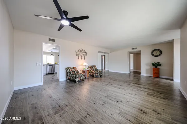 a view of livingroom with furniture and wooden floor