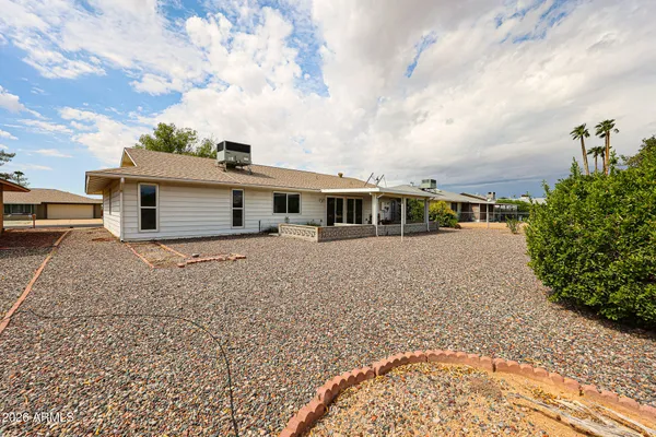 front view of a house with a dry yard