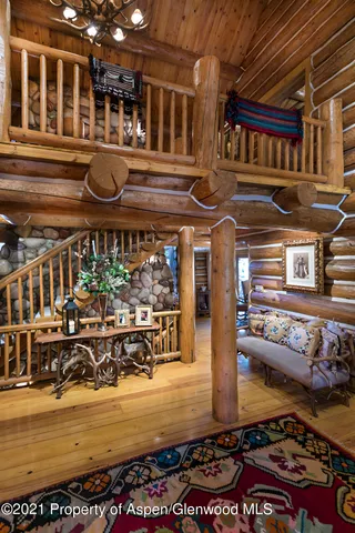 a kitchen with a stove a sink and cabinets