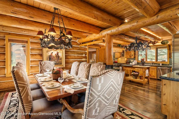 a kitchen with granite countertop stainless steel appliances and wooden cabinets