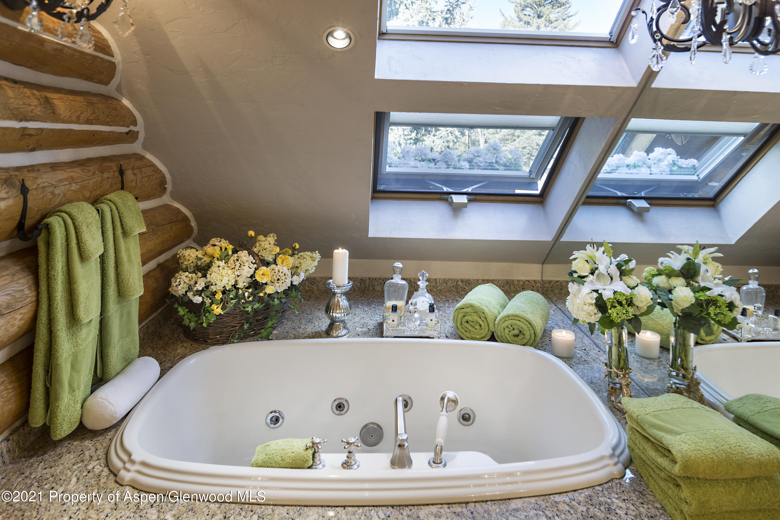 770 Twining Flats Road Woody Creek, CO 81611 - Photo 28 of 59 a white bath tub sitting in a bathroom
