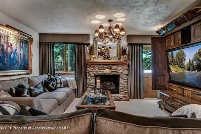 a view of a park with large trees