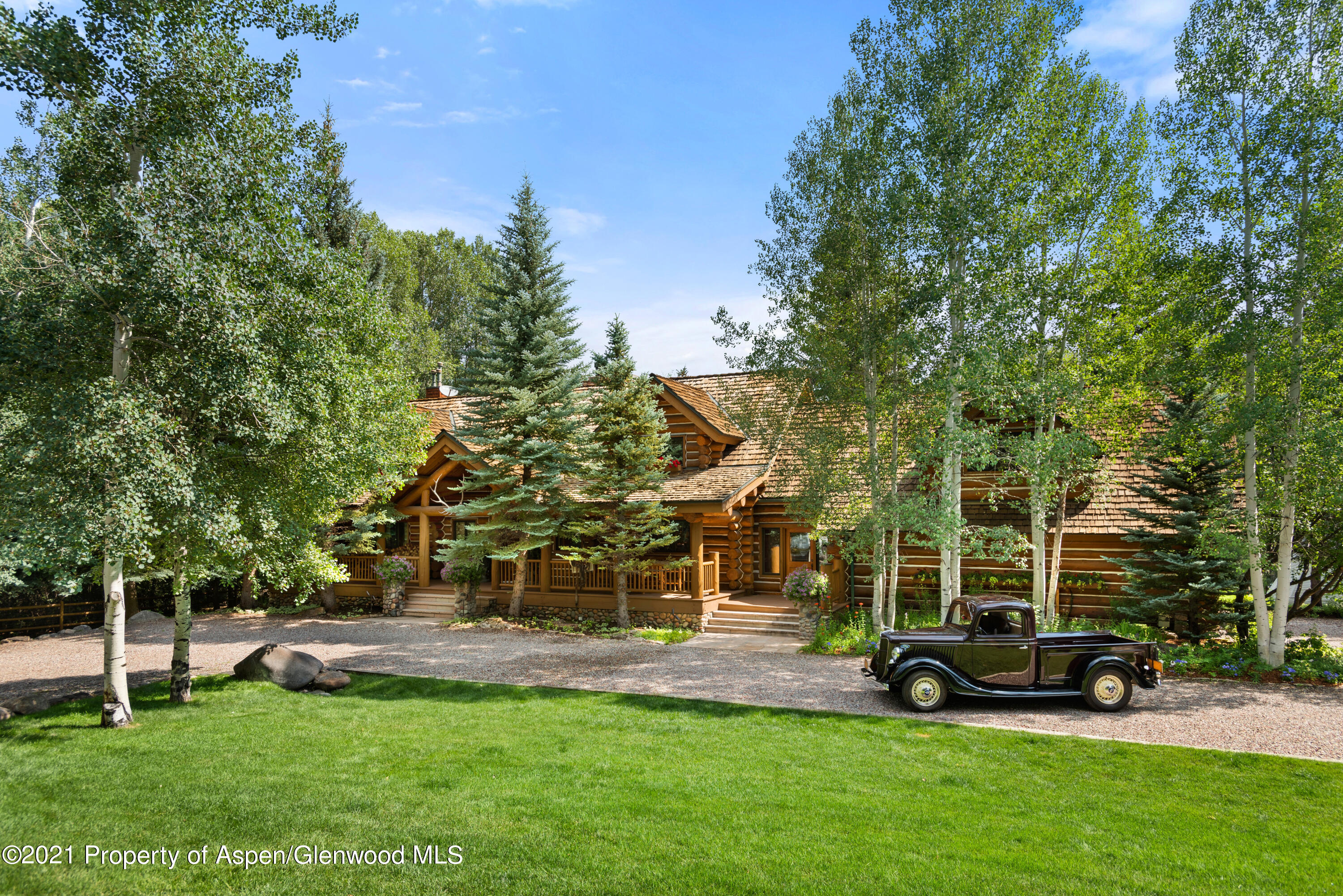 770 Twining Flats Road Woody Creek, CO 81611 - Photo 46 of 59 a view of a park with large trees