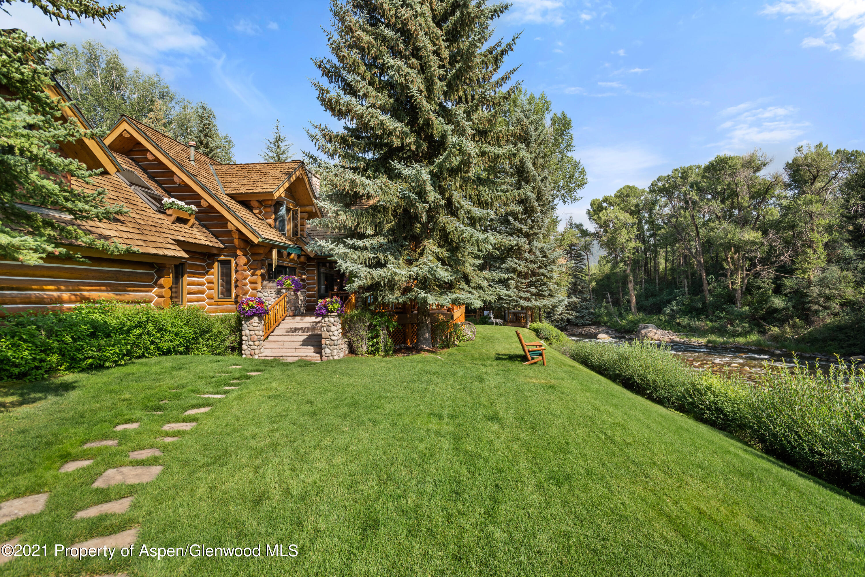 770 Twining Flats Road Woody Creek, CO 81611 - Photo 48 of 59 a view of a house with a park