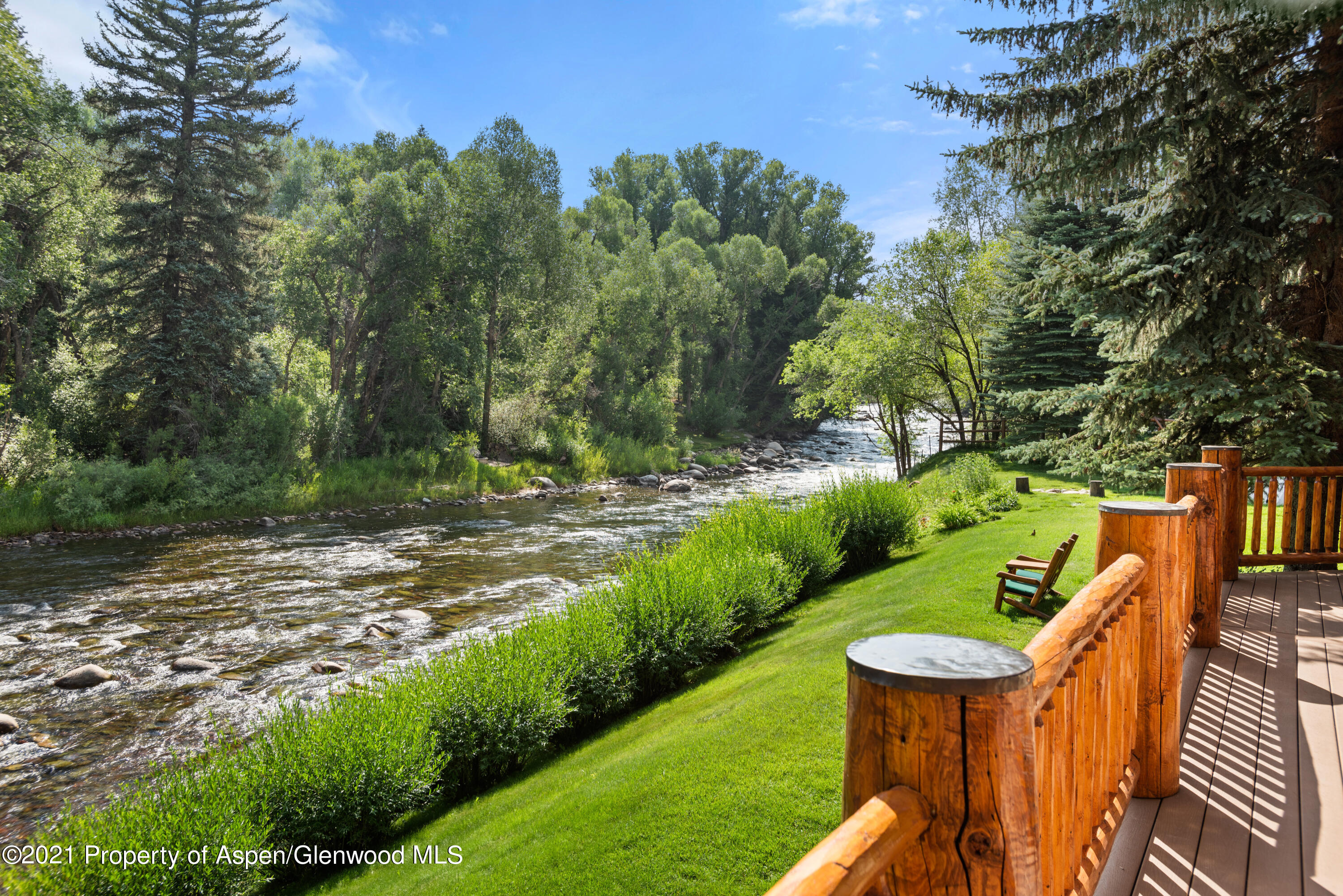 770 Twining Flats Road Woody Creek, CO 81611 - Photo 5 of 59 a view of a garden with wooden fence