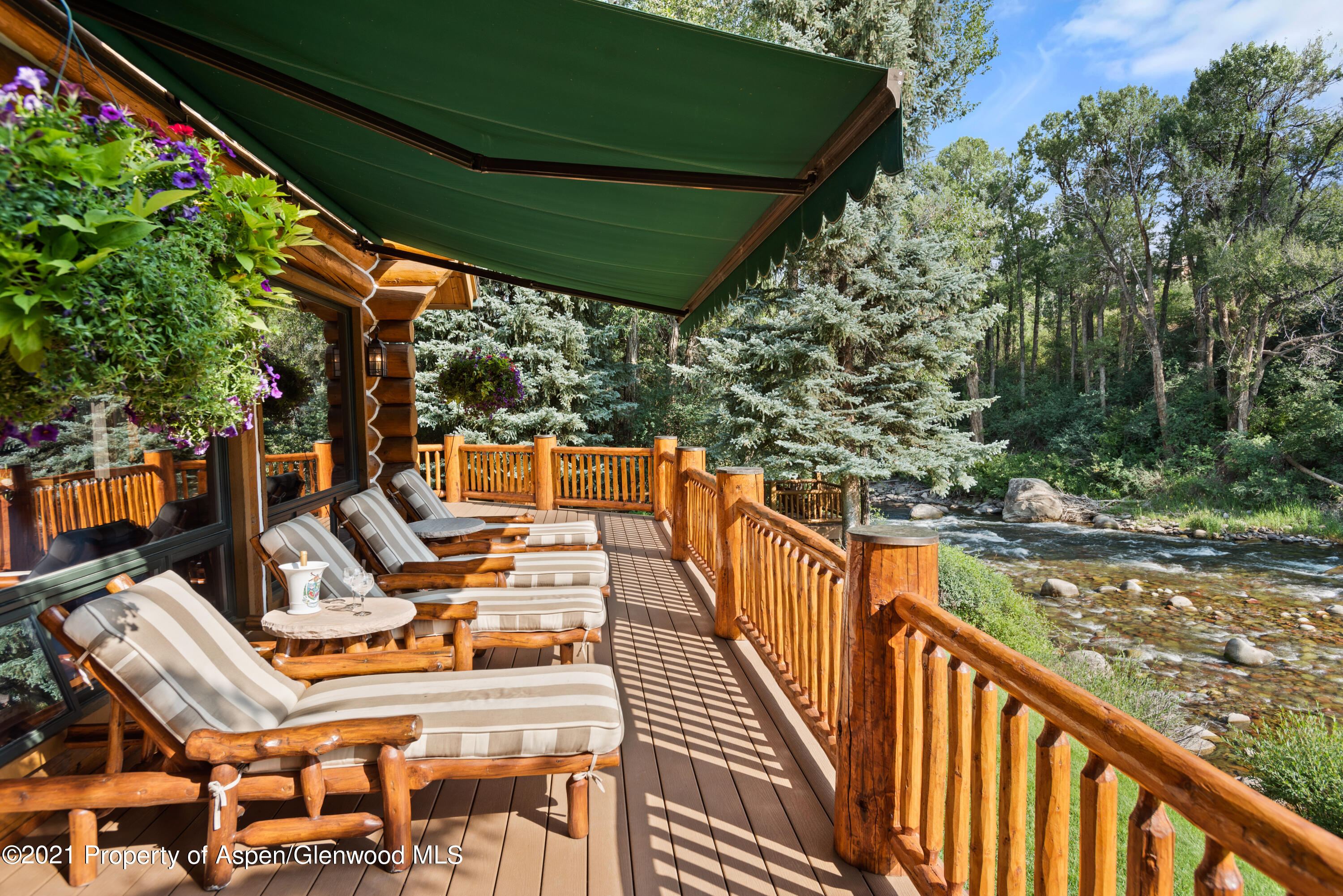 770 Twining Flats Road Woody Creek, CO 81611 - Photo 6 of 59 a view of balcony with wooden floor and outdoor seating