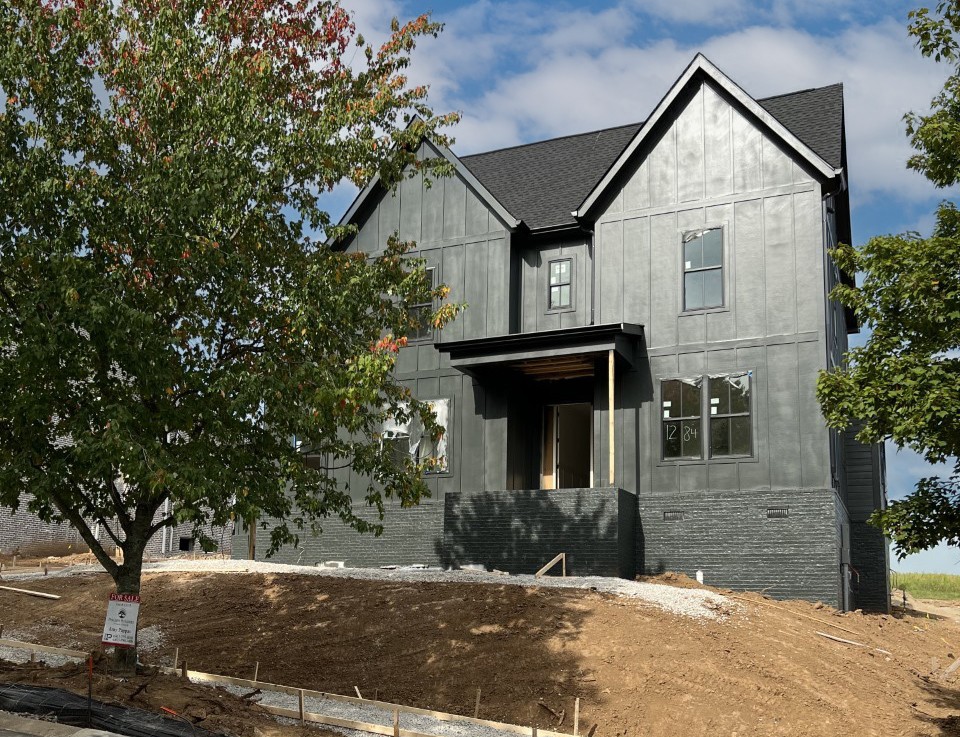 131 Alfred Ladd Road Franklin, TN 37064 - Photo 1 of 34 a front view of a house with yard