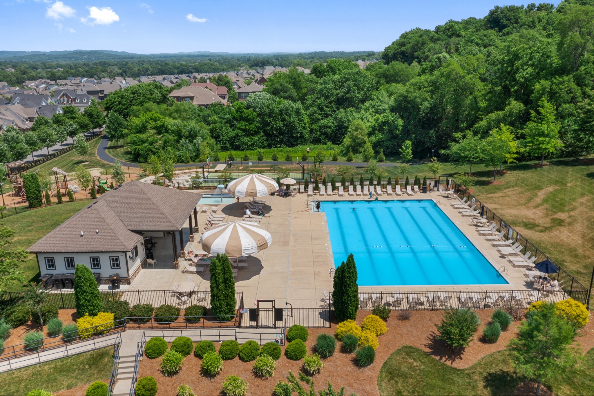 131 Alfred Ladd Road Franklin, TN 37064 - Photo 27 of 34 a view of swimming pool with outdoor seating and plants