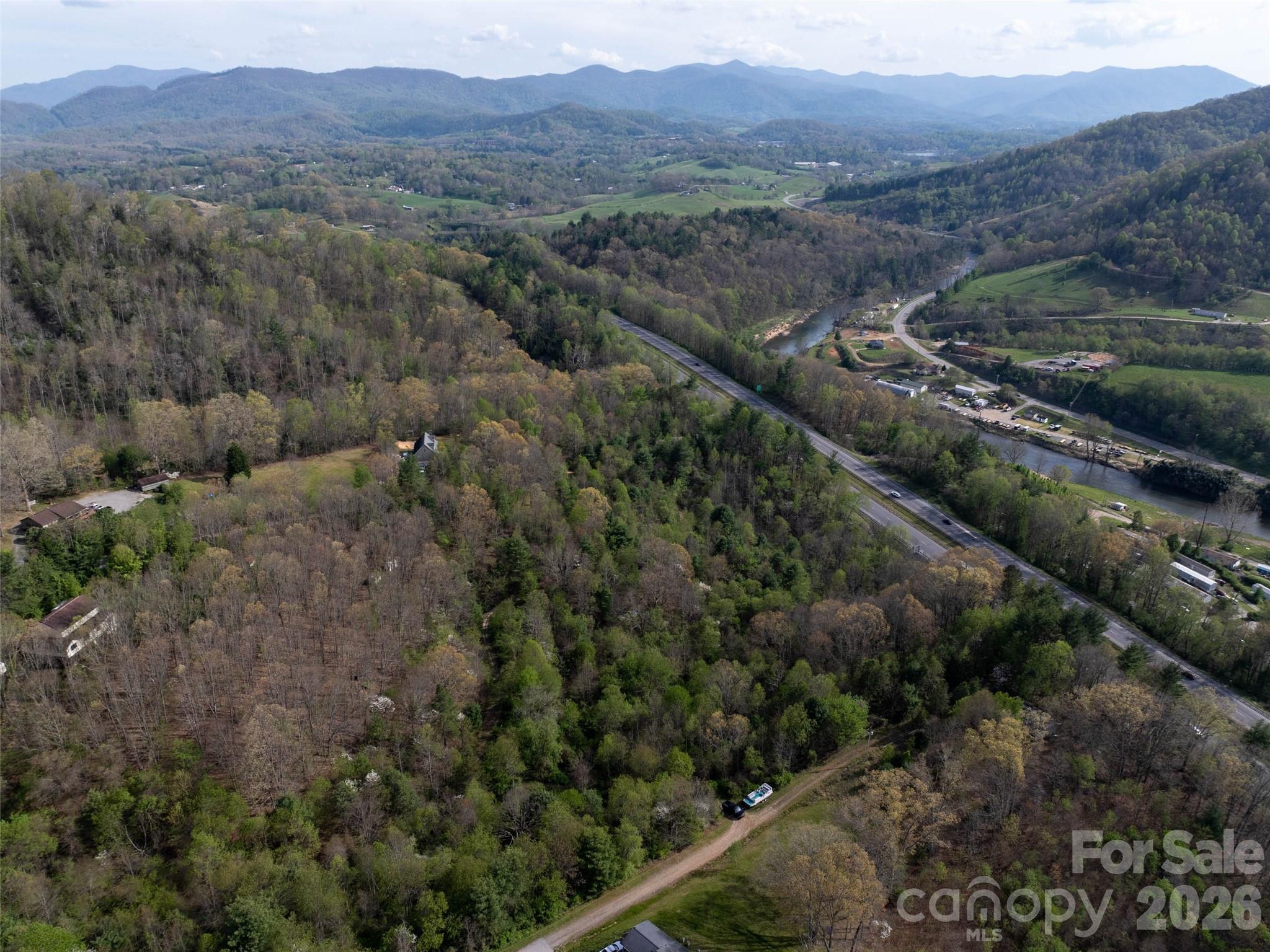 Lot 38 Sunnybrook Trail Clyde, NC 28721 - Photo 11 of 11 an aerial view of residential house and sandy dunes
