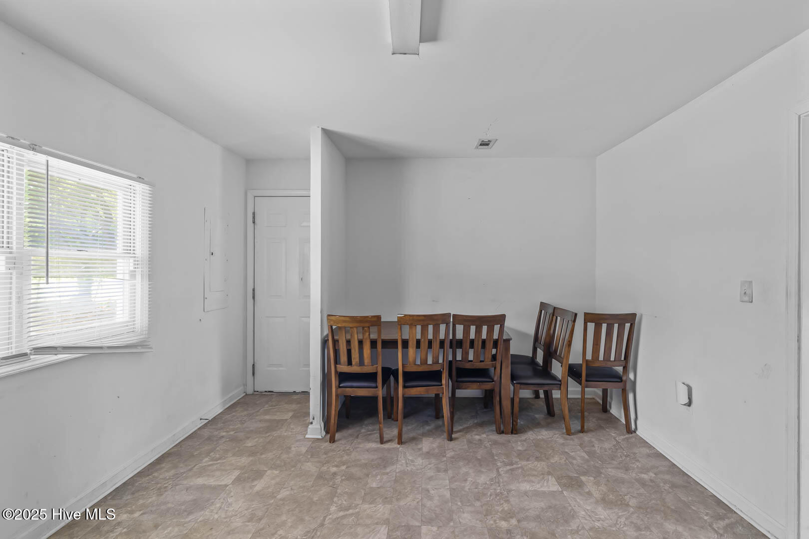 103 Riegel Drive Hubert, NC 28539 - Photo 14 of 17 Dining Combo and Garage Entrace Door