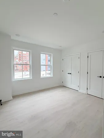 an empty room with windows