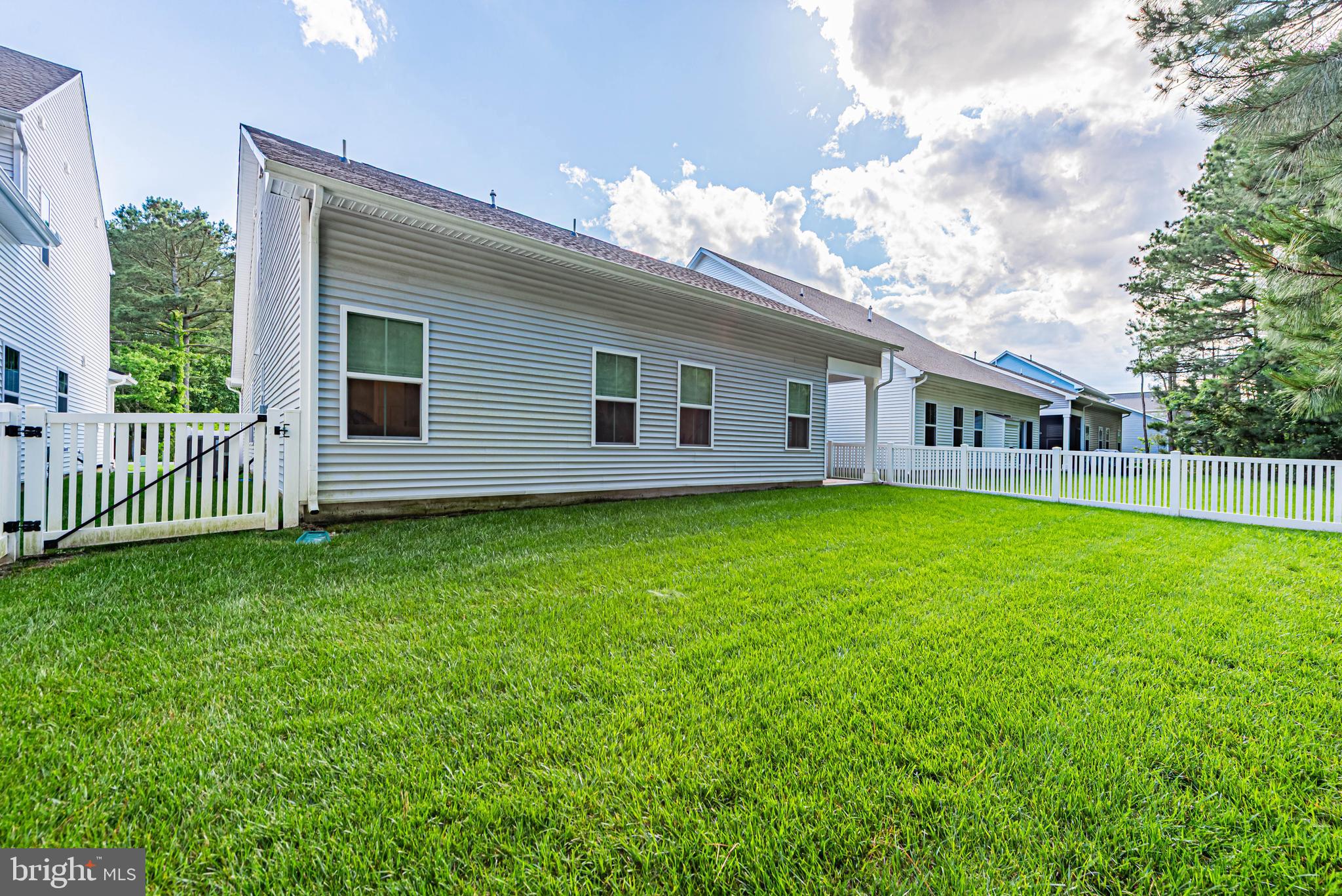 12115 Snug Harbor Road Berlin, MD 21811 - Photo 2 of 46 a view of a house with a backyard